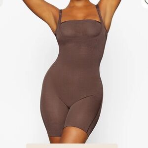 Skims sheer sculpt open bust body suit NWT medium